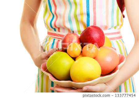 housewife or seller offering healthy fruits isolated 133777454