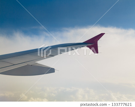 Beautiful white clouds and blue sky from plane 133777621