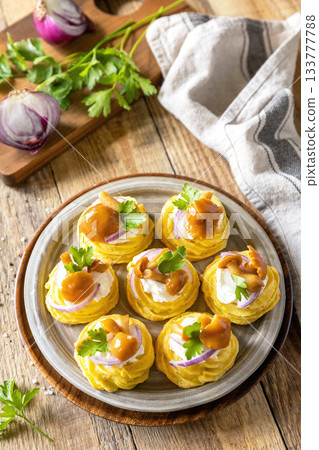 Potato tartlets filled with cottage cheese and marinated mushrooms. 133777788