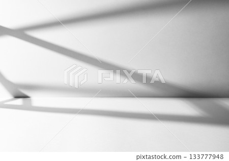 Geometric shadows cast on white background. Geometric shadows cast on white background. 133777948