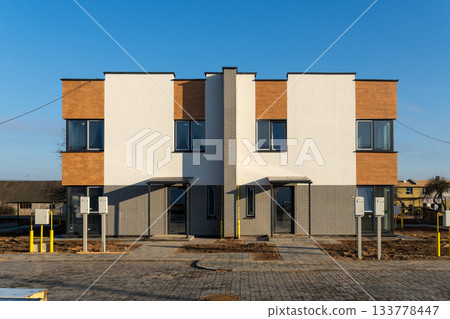 New modern two-story townhouse building exterior New modern two-story townhouse building exterior 133778447