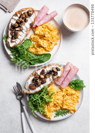 Healthy balanced breakfast with scrambled eggs Healthy balanced breakfast with scrambled eggs 133778498