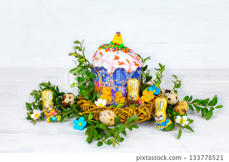 Easter cake and painted eggs, white flowers, festive composition in rustic style,ukrainian orthodox tradition, vintage wooden background, selective focus Easter cake and painted eggs, white flowers, festive composition in rustic style,ukrainian orthodox tradition, vintage wooden background, selective focus 133778521