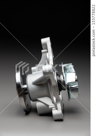 New spare part on a gradient gray background7 Internal combustion engine cooling system pump New spare part on a gradient gray background7 Internal combustion engine cooling system pump 133778822