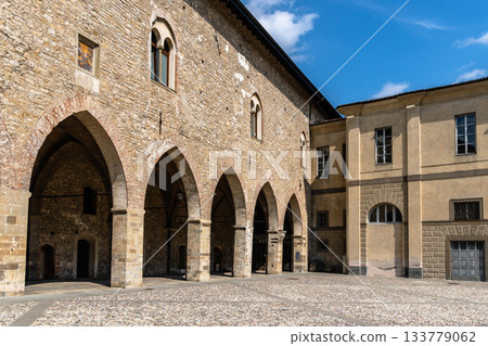 Bergamo's historic architecture under a bright blue sky 133779062