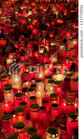 flaming red candles , a place of reverence , abstract background flaming red candles , a place of reverence , abstract background 133779092