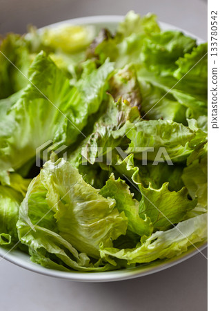 Green salad in a white bowl 133780542