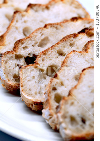 Macrophotography of rustic bread in a kitchen Macrophotography of rustic bread in a kitchen 133780546