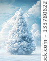 Majestic Christmas tree surrounded by fluffy clouds and clear blue sky in winter season 133780622