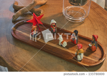 Handmade folk art nativity scene figures on wooden tray Handmade folk art nativity scene figures on wooden tray 133780800