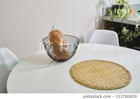 Whole grain bread in basket on modern kitchen table Whole grain bread in basket on modern kitchen table 133780829