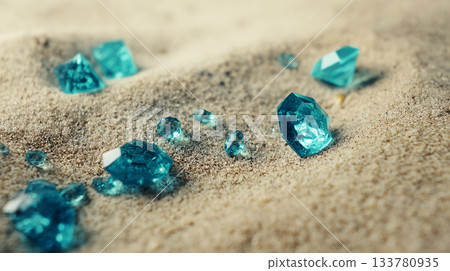 photo of turquoise crystals scattered on the sea sand, can be used as poster or banner 133780935