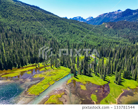 Nature landscape. Cooper Lake in Washington. Scenic nature of popular hiking Cooper lake. Cooper lake with mountain landscape. Landscape of mountain and forest of Cooper lake. Breathtaking landscape Nature landscape. Cooper Lake in Washington. Scenic nature of popular hiking Cooper lake. Cooper lake with mountain landscape. Landscape of mountain and forest of Cooper lake. Breathtaking landscape 133781544
