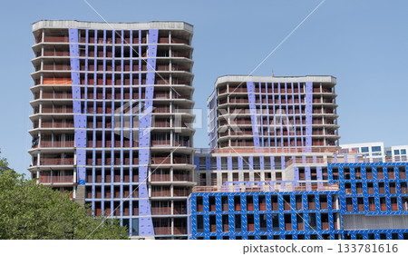 Construction site. Structural design engineering at building site. Formwork construction architecture. Architectural building. Building architecture is under construction Construction site. Structural design engineering at building site. Formwork construction architecture. Architectural building. Building architecture is under construction 133781616