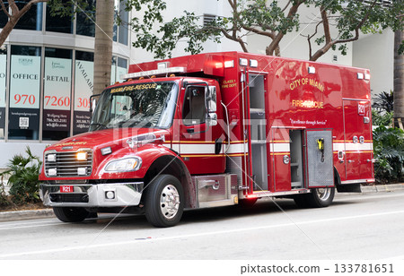 Miami, Florida, USA - December 01, 2024: Firetruck vehicle, side view. Red Fire Truck. Firetruck. Fire rescue in city of Miami. Big firetruck outdoor. Fire rescue operation Miami, Florida, USA - December 01, 2024: Firetruck vehicle, side view. Red Fire Truck. Firetruck. Fire rescue in city of Miami. Big firetruck outdoor. Fire rescue operation 133781651