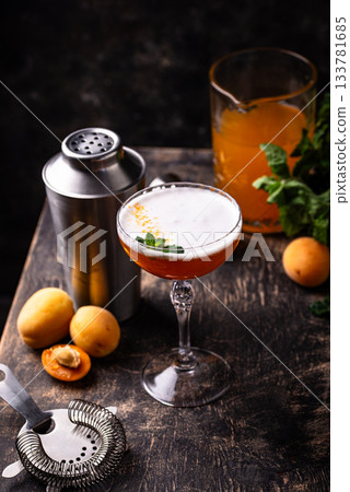 Fresh apricot cocktail martini with mint Fresh apricot cocktail martini with mint 133781685