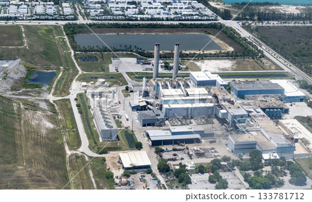 Industry urban area. Industrial zone with waste incineration plant. Incineration facility factory. Waste incineration plant, Miami Dade. Industrial facility of waste recycle. Aerial landscape 133781712