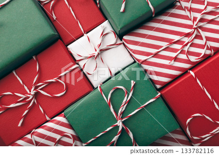 Color gift boxes on color background, flat lay 133782116