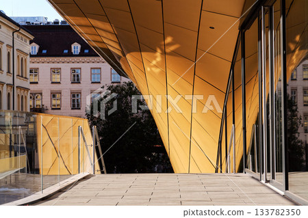 Masarycka MSD Masaryk Station Development office and retail building by Zaha Hadid Architects with golden facade on November 19, 2025 in Prague, Czech Republic. Masarycka MSD Masaryk Station Development office and retail building by Zaha Hadid Architects with golden facade on November 19, 2025 in Prague, Czech Republic. 133782350