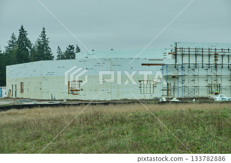 Milton WA USA, Nov 29, 2025 - New warehouses under construction on a new site Milton WA USA, Nov 29, 2025 - New warehouses under construction on a new site 133782886