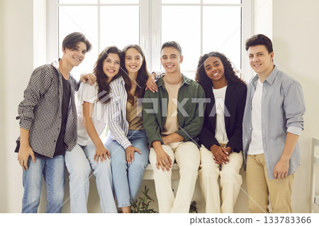 Group portrait of young happy diverse graduate students, teens, college friends close together Group portrait of young happy diverse graduate students, teens, college friends close together 133783366