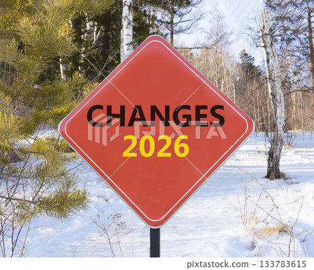 Changes 2026 symbol. Concept words Changes 2026 on beautiful red road sign. Beautiful winter forest background. Business and changes 2026 concept. Copy space. 133783615
