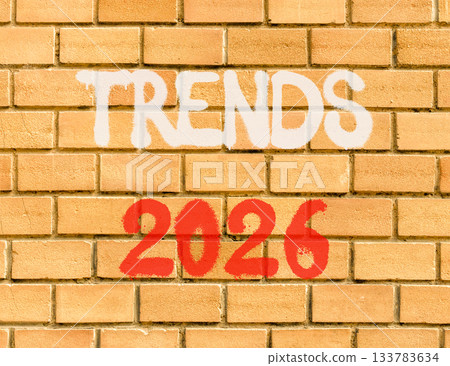 Trends 2026 new year symbol. Concept words Trends 2026 on beautiful old brown brick wall. Beautiful old brown brick wall background. Business and Trends 2026 new year concept. Copy space. 133783634