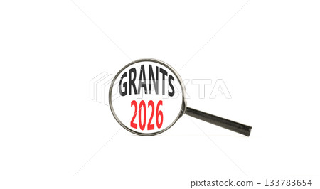 Grants 2026 symbol. Concept words Grants 2026 on beautiful white paper. Black magnifying glass. Beautiful white paper background. Business and grants 2026 concept. Copy space. Grants 2026 symbol. Concept words Grants 2026 on beautiful white paper. Black magnifying glass. Beautiful white paper background. Business and grants 2026 concept. Copy space. 133783654