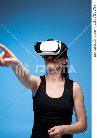 Engineer Navigating 3D Architectural Model Using VR Controls for Precise Spatial Examination Engineer Navigating 3D Architectural Model Using VR Controls for Precise Spatial Examination 133783758