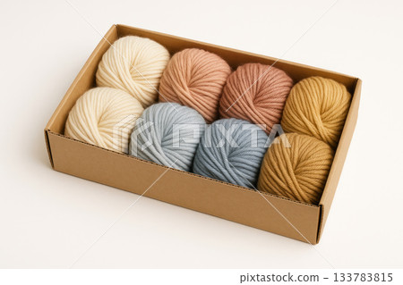 A set of balls of thick yarn of different colors in a box. A set of balls of thick yarn of different colors in a box. 133783815
