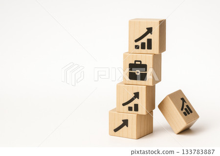 Wooden cubes with height arrows and a briefcase icon. Space for text. Wooden cubes with height arrows and a briefcase icon. Space for text. 133783887