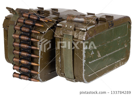 Ammo boxes with ammunition belt and 7.62 mm cartridges for kalashnikov PK or PKM machine gun isolated on white. Ammo boxes with ammunition belt and 7.62 mm cartridges for kalashnikov PK or PKM machine gun isolated on white. 133784289