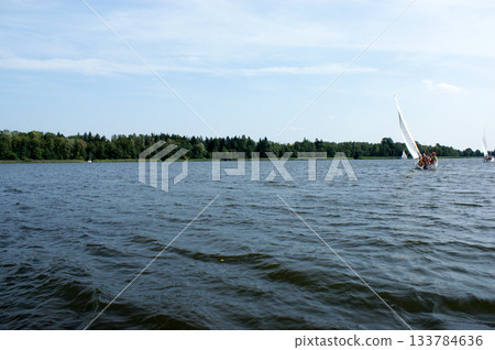 sailboat boat floats on the lake sailboat boat floats on the lake 133784636