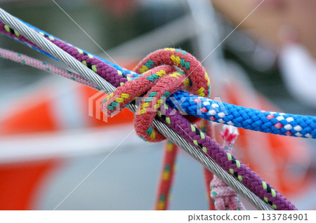 Knot of yacht ropes in different colors Knot of yacht ropes in different colors 133784901