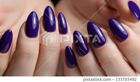 A close-up shot of a woman's hands with a perfect manicure 133785492
