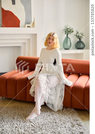 Woman with flowers, Seated woman holding tulips in modern 133785820