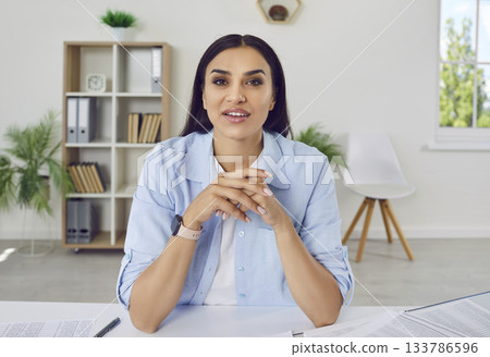 Businesswoman on Webcam in Online Meeting at Home or Office 133786596