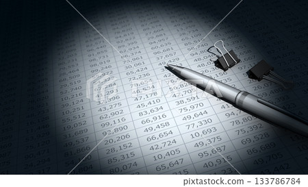 Numerical data and ballpoint pen illuminated by spotlight, image of business performance verification and data analysis 133786784
