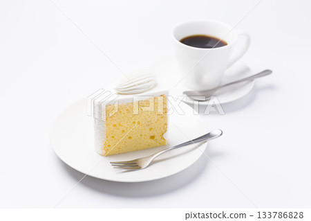 Cake and coffee on a plate Chiffon cake White background 133786828