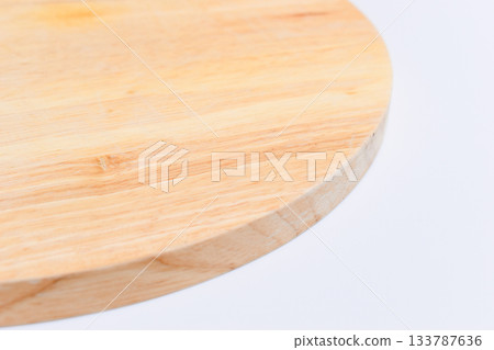 brown wooden sphere cuttingboard isolated on white background 133787636