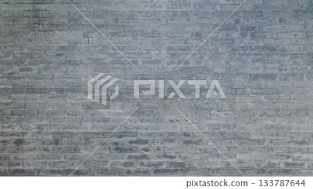 grey brick wall background design, construction industry 133787644