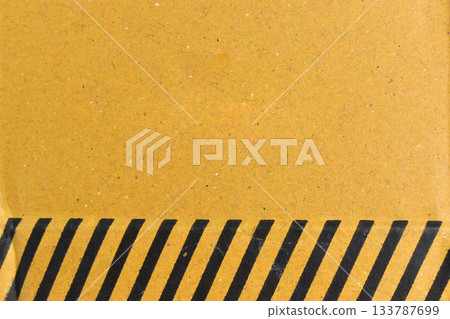 striped black and yellow cardboard box texture background 133787699