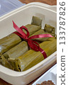 Traditional Indonesian Lontong Wrapped in Banana Leaves with Ribbon 133787826