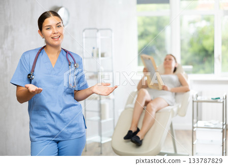 Young woman doctor posing in medical room 133787829