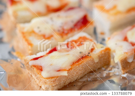 Bite-sized pizza toast for snacks Bite-sized pizza toast for snacks 133788079