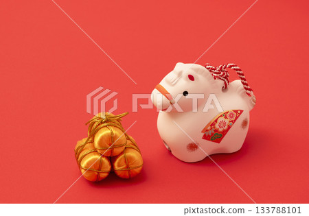Japanese New Year's material. The zodiac sign of the horse. Horse figurine on a red background Japanese New Year's material. The zodiac sign of the horse. Horse figurine on a red background 133788101