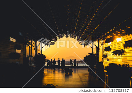 Nov 16 2025 Elegant Atrium Interior Featuring Sunset and Architectural Silhouettes Nov 16 2025 Elegant Atrium Interior Featuring Sunset and Architectural Silhouettes 133788517