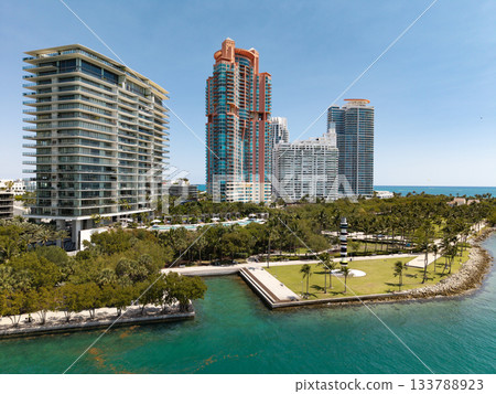 Miami cityscape with luxury skyscrapers and ocean. Panoramic drone view of Miami coastline. Miami Beach from above. Miami skyline from top. Miami cityscape with luxury skyscrapers and ocean. Panoramic drone view of Miami coastline. Miami Beach from above. Miami skyline from top. 133788923
