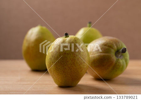 Fresh pear on wooden background Fresh pear on wooden background 133789021