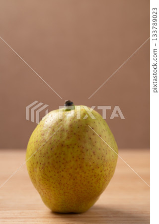 Fresh pear on wooden background Fresh pear on wooden background 133789023